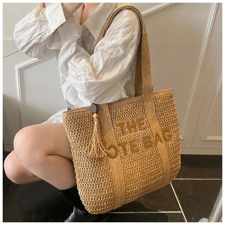 Travel large capacity grass woven bag for women 2025 new high-end handmade woven shoulder bag, beach vacation tote bag